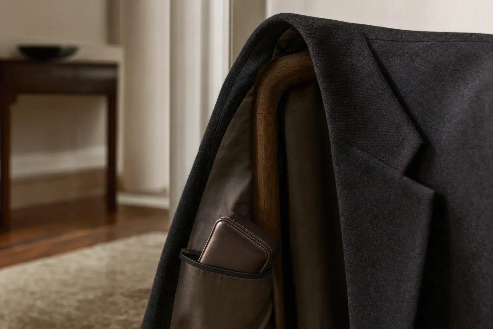 A slim ring case tucked inside a jacket's inner pocket