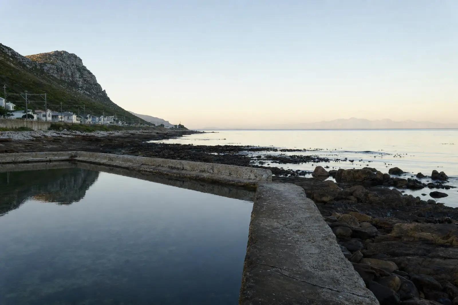 An empty tidal pool on the False Bay coast at low tide, early morning